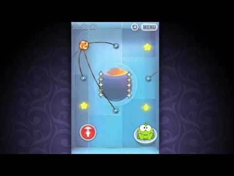 alt text: Chú ếch xanh Om Nom đang chờ được ăn kẹo trong game Cut the Rope