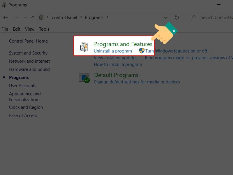 Vào mục Programs and Features