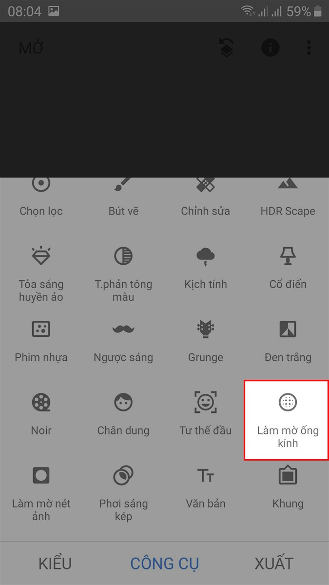 alt text: Chọn công cụ Làm mờ ống kính trong Snapseed