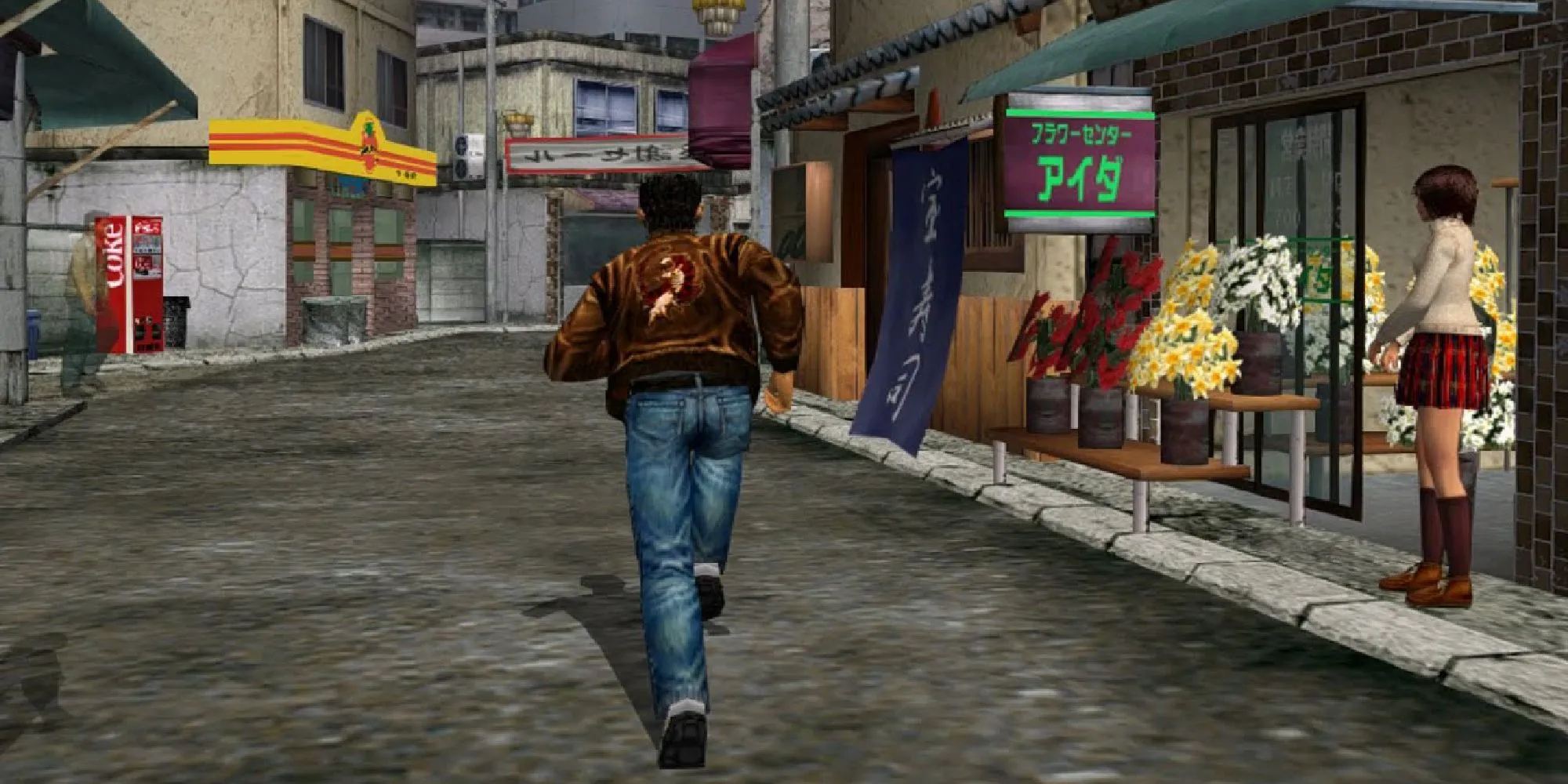 Ảnh chụp màn hình gameplay của Shenmue cho thấy nhân vật Ryo Hazuki đi trên đường phố Nhật Bản