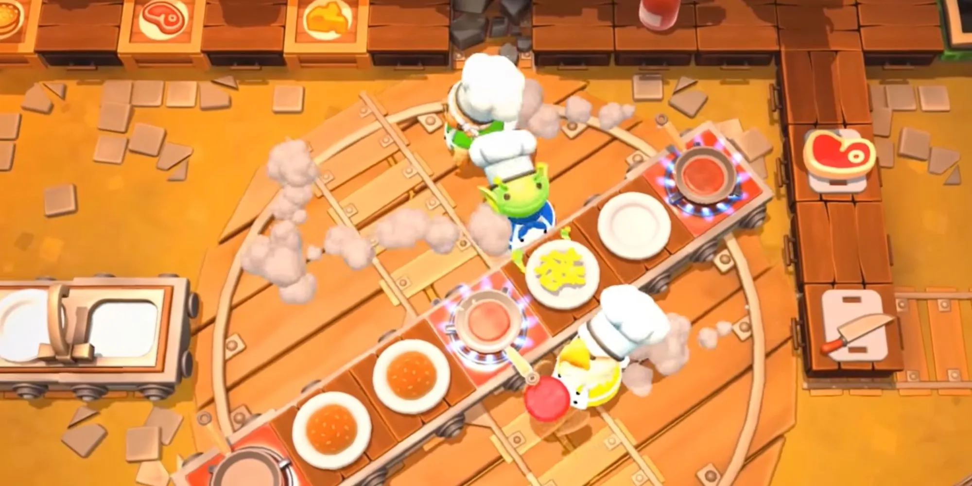 Ba người chơi đang cố gắng nấu ăn trong một màn chơi xoay tròn của Overcooked 2