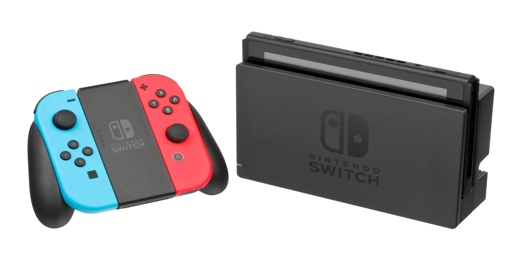 Bộ điều khiển Joy-Con màu đỏ và xanh dương đặt cạnh máy console Nintendo Switch đang cắm dock, trên nền trắng