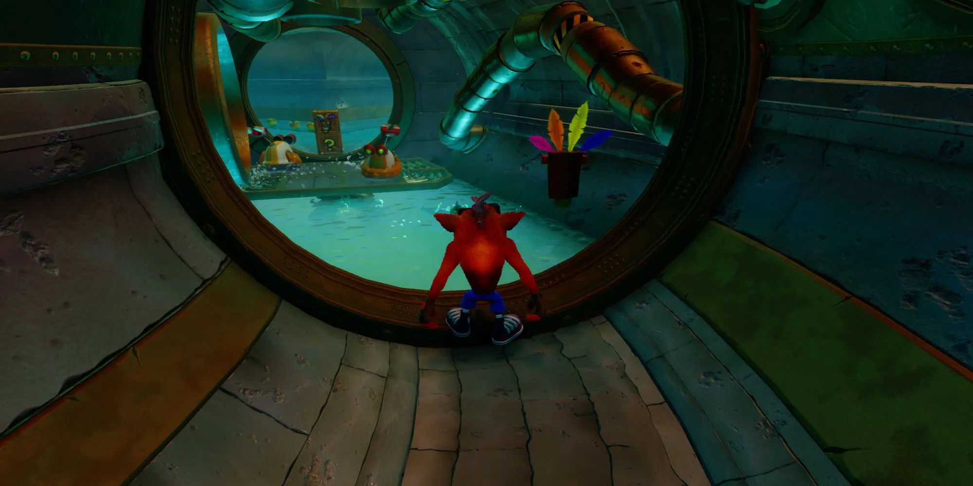 Crash Bandicoot len lỏi qua những đường ống chật hẹp, né tránh những con lươn điện trong màn chơi The Eel Deal của Crash Bandicoot 2