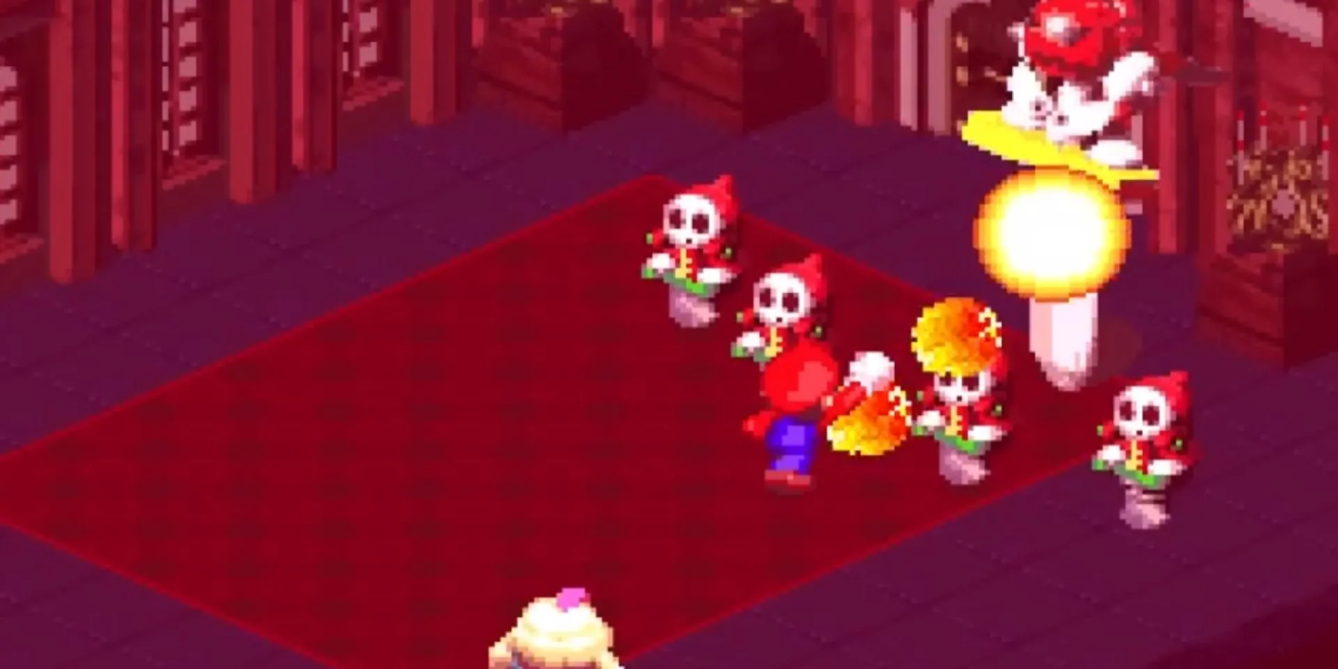 Mario sử dụng Fire Sphere tấn công Mack trong cảnh chiến đấu trong game Super Mario RPG Legend of the Seven Stars