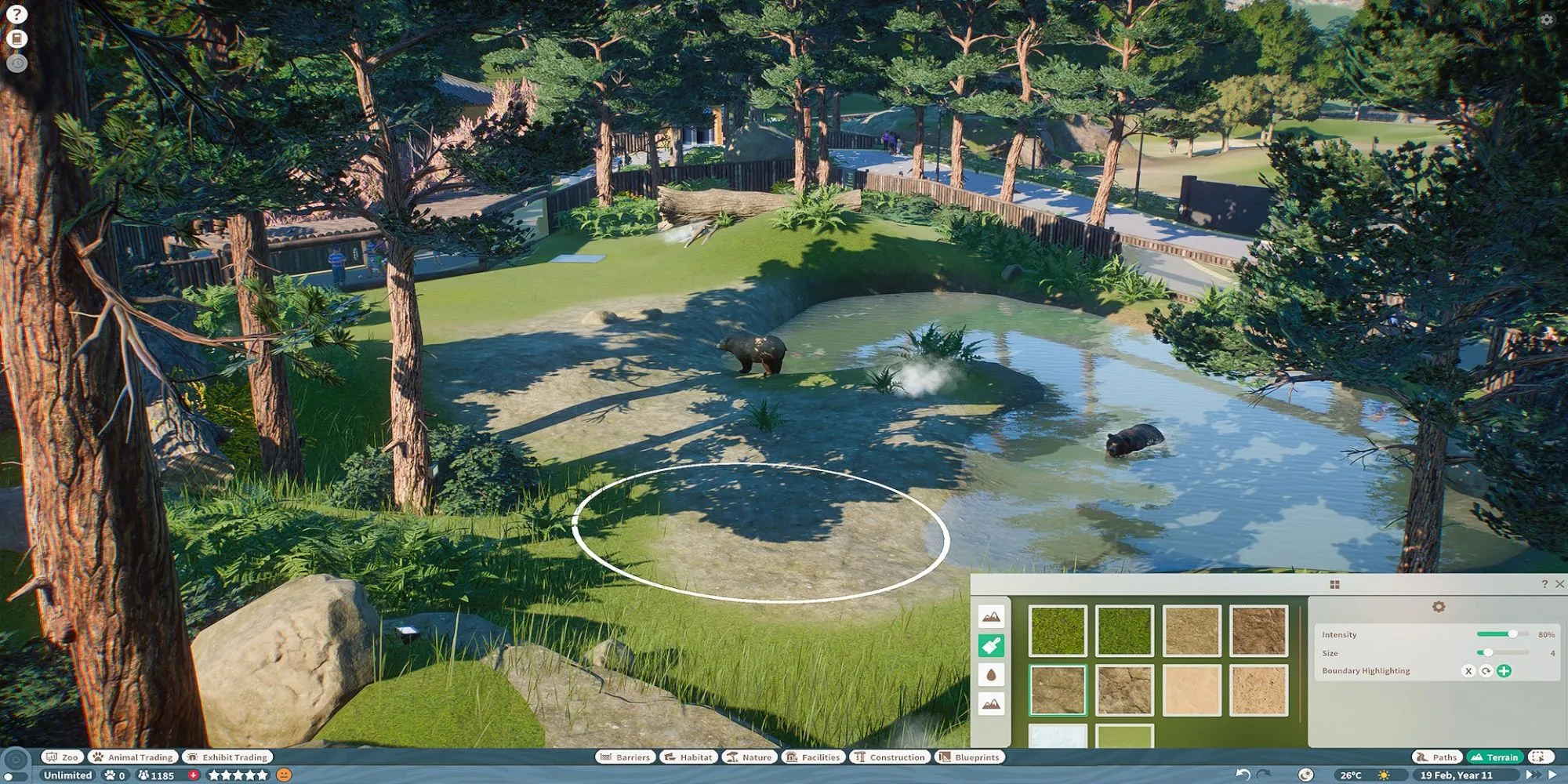 Một góc nhìn trong game Planet Zoo với các loài động vật và chuồng trại cần được dọn dẹp