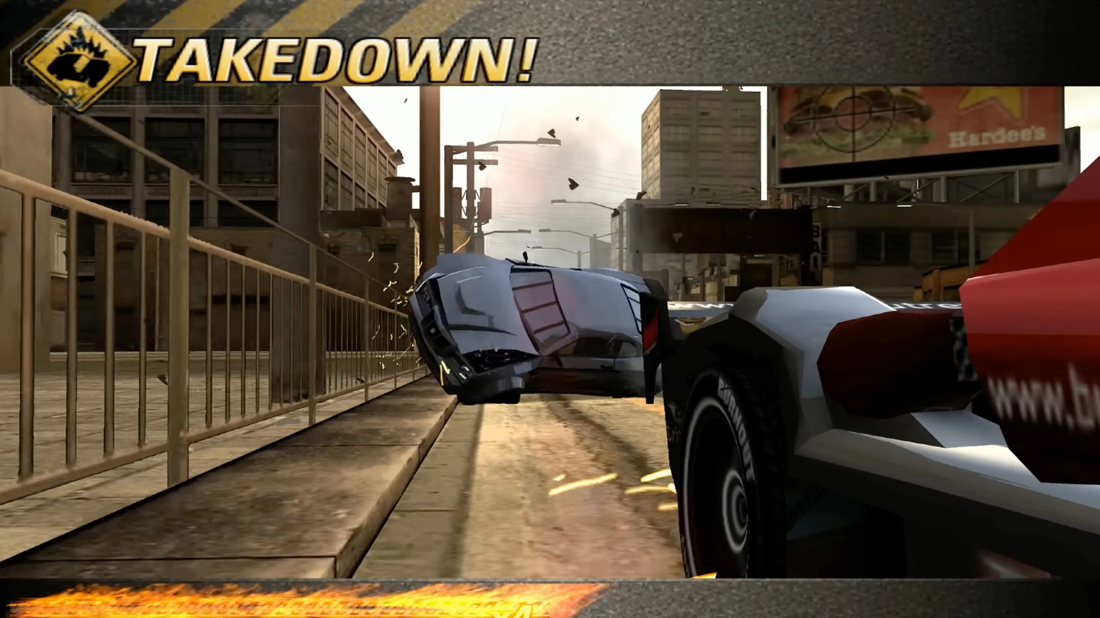 Một pha Takedown ấn tượng trong game Burnout Revenge với hiệu ứng cháy nổ đặc trưng