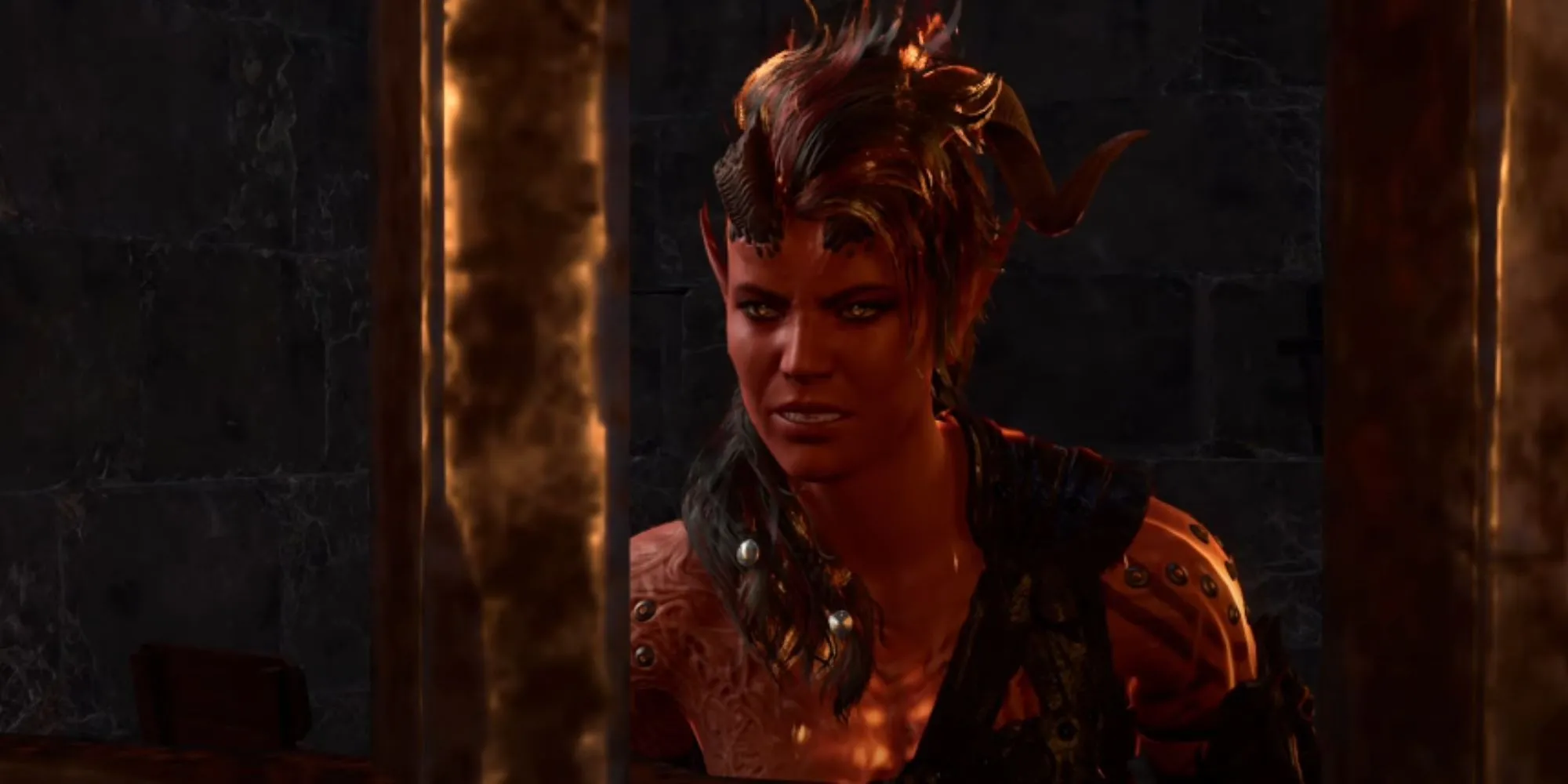 Nhân vật Karlach trong Baldur's Gate 3, do Samantha Béart lồng tiếng, với biểu cảm đầy nội tâm