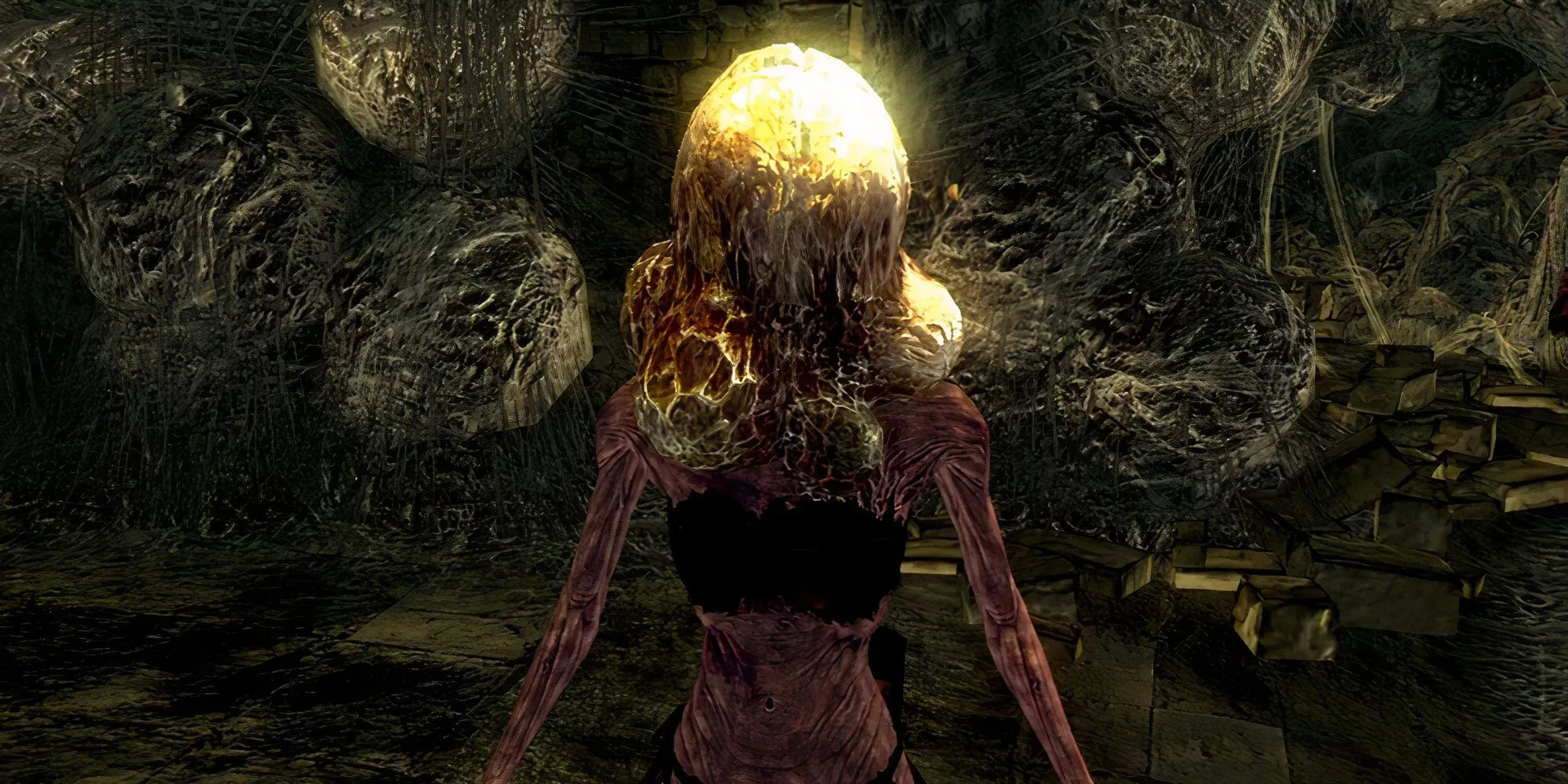 Nhân vật trong Dark Souls với một quả trứng ký sinh khổng lồ trên đầu, biểu hiện của hiệu ứng Egghead