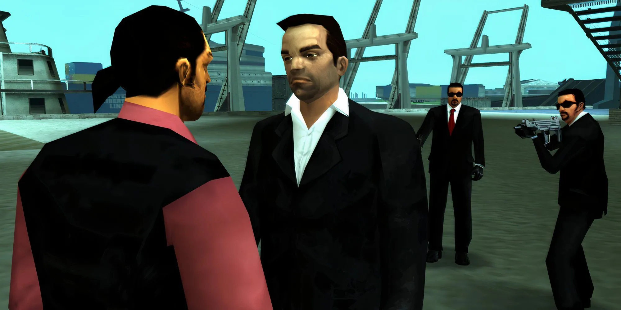 Top Nhân Vật Chính GTA: Ai Là Gương Mặt Đáng Nhớ Nhất Series? 1 Toni Cipriani trong GTA Liberty City Stories đang trò chuyện với người khác, xung quanh là súng ống