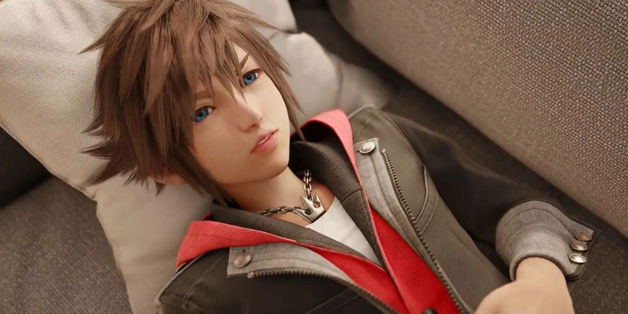 Sora nằm trên sofa sau khi tỉnh dậy trong Kingdom Hearts 4.