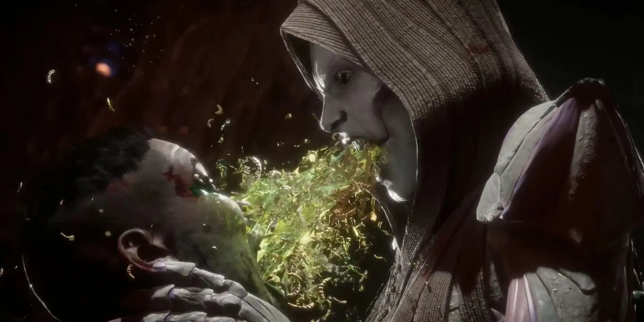 D'Vorah phun axit vào mặt Jax trong Fatality New Species ở Mortal Kombat 11