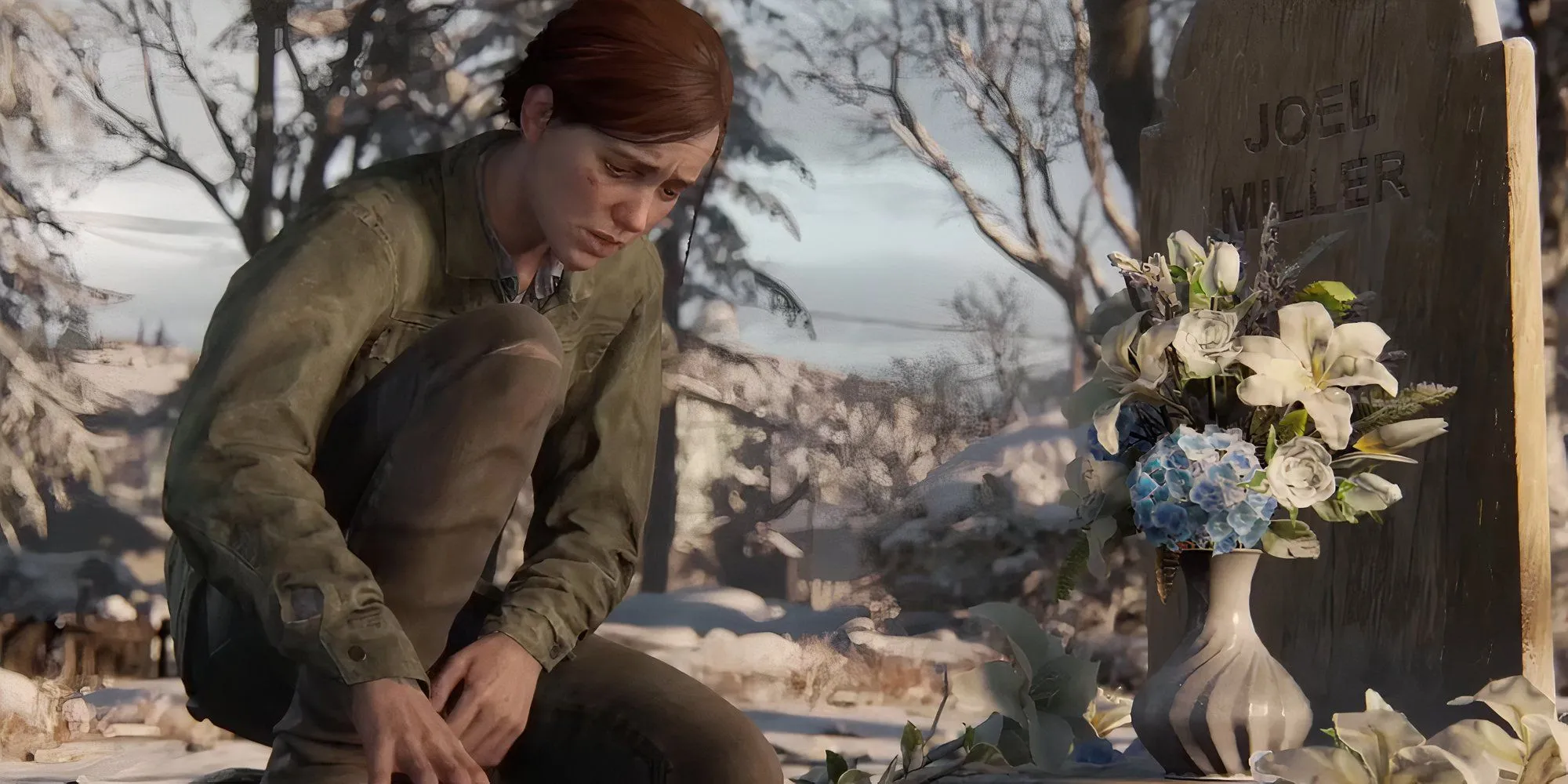 Ellie Williams ngồi cạnh giường ngủ của Joel Miller trong một cảnh hồi tưởng của The Last of Us Part 2.