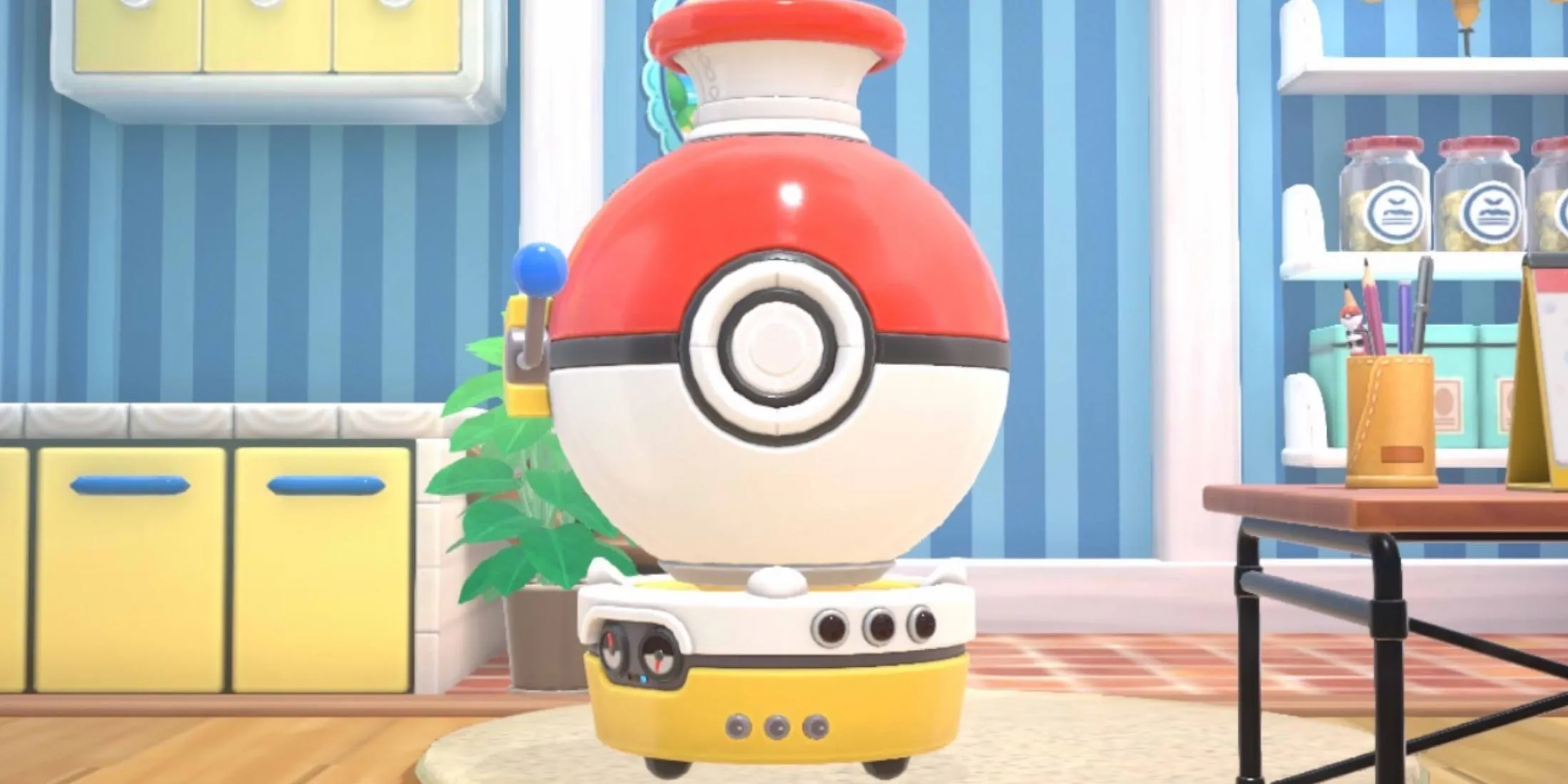 Máy Plush-O-Matic hình quả cầu Poke Ball khổng lồ trong Pokemon Friends, nơi người chơi dùng sợi để tạo ra các loại thú nhồi bông Pokemon.