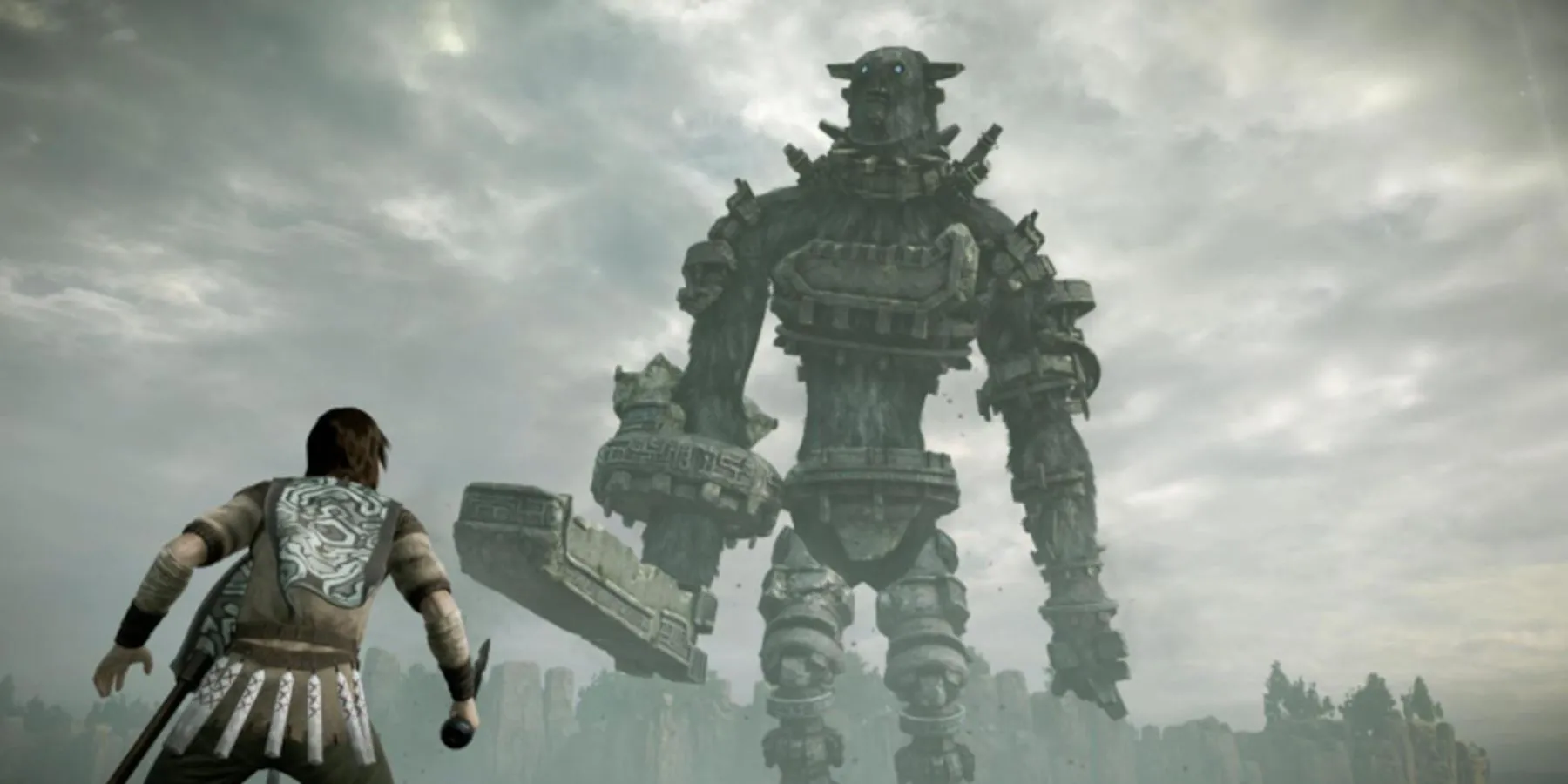 Wander chuẩn bị chiến đấu với một Colossus khổng lồ trong Shadow of the Colossus.